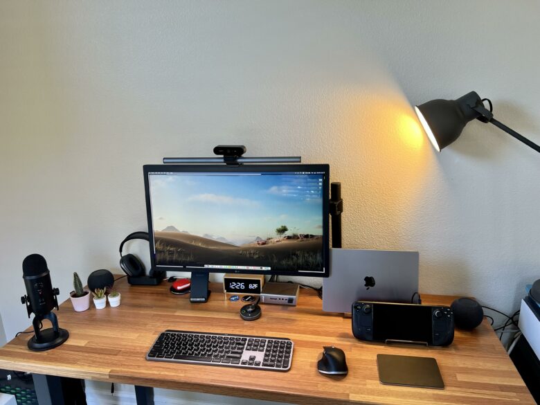 Two computers live here: a 14-inch M1 Pro MacBook and a Steam Deck for gaming.