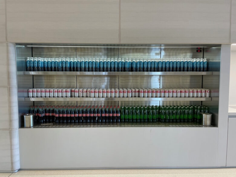These refrigerated shelves in the walls are always kept perfectly stocked with beverages.