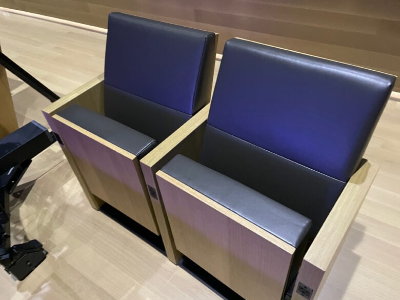 A close-up look at a pair of seats in the Big Sure Theater at the Apple Developer Center. They are comfortable, but a bit narrow.