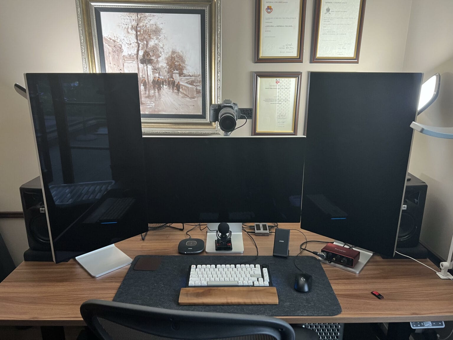 A 2019 Mac Pro is the core of this computer setup, along with a 16-inch M1 Pro MacBook (not pictured).