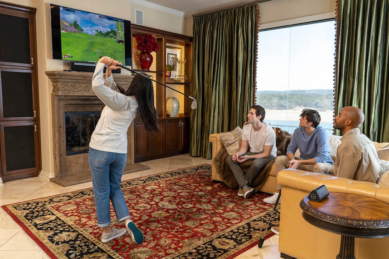 The only thing missing is a golf cart with this home golf simulator.