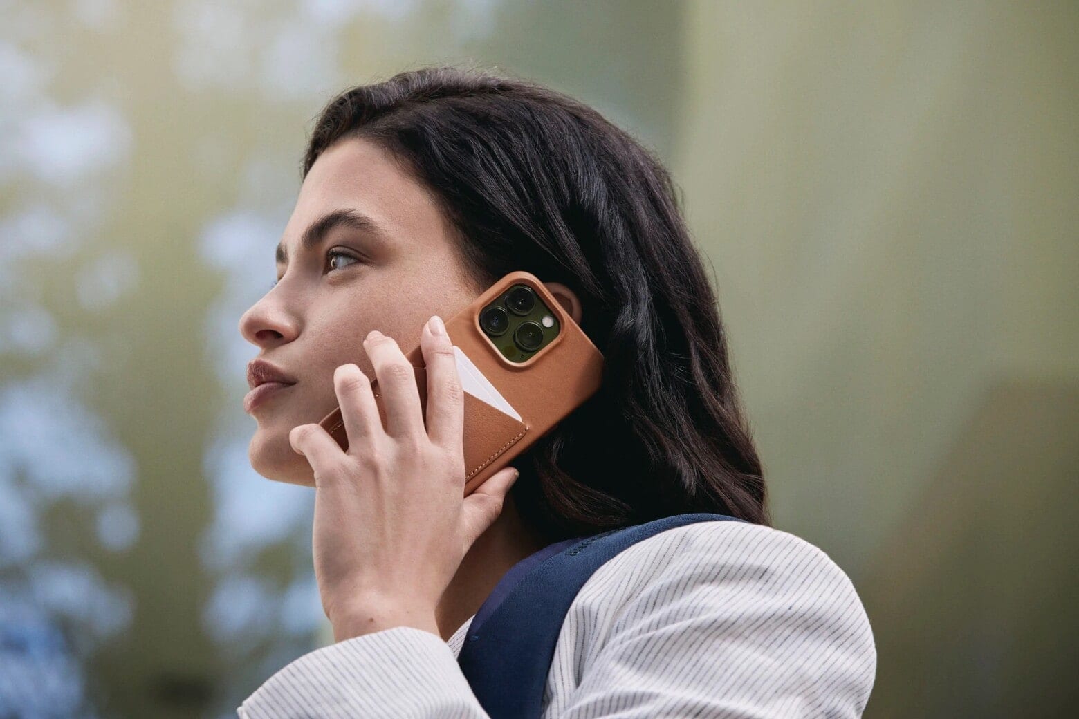 Mujjo's leather wallet case carries up to three cards.