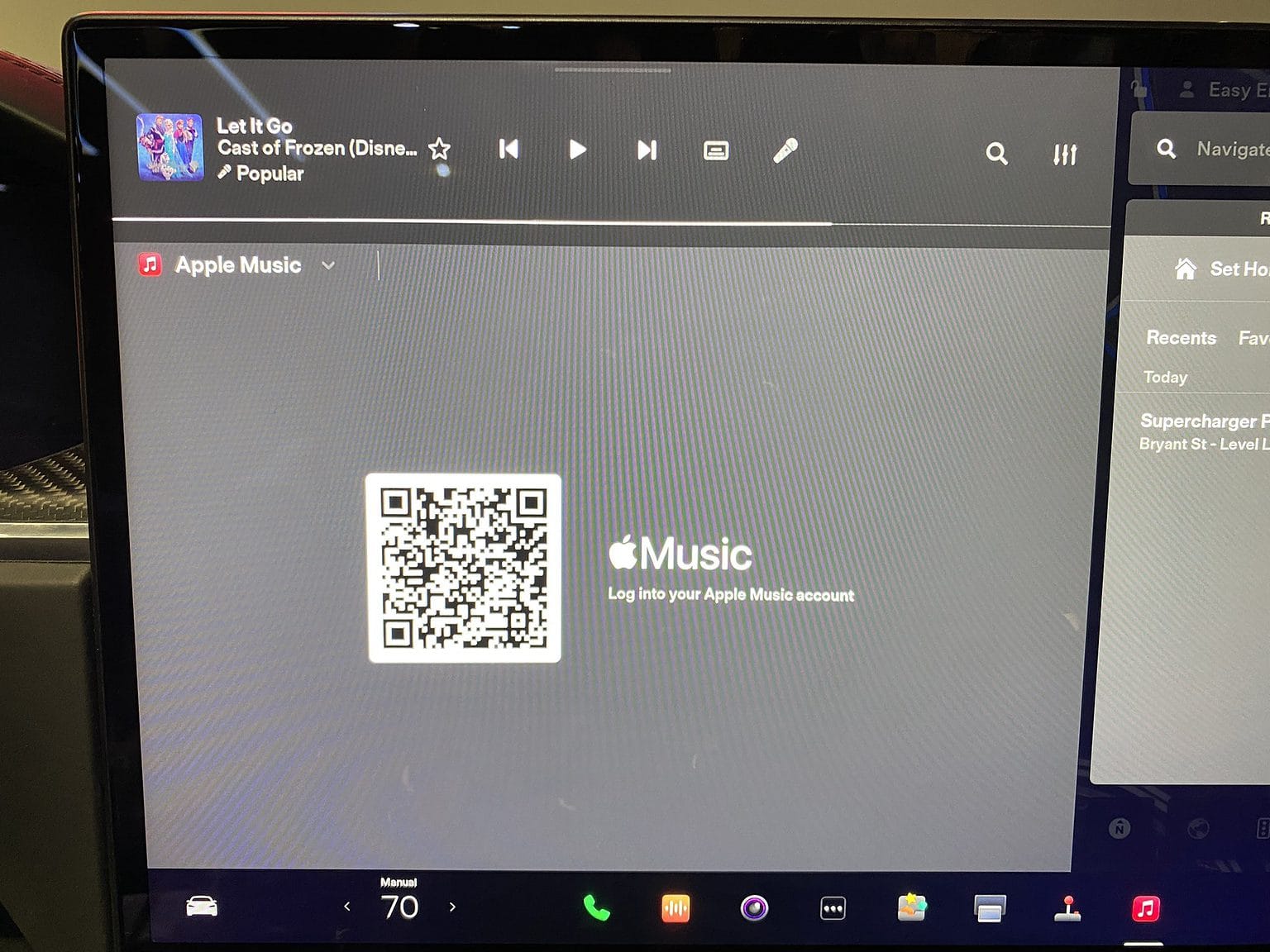 Tesla's interface in the museum exhibit showed Apple Music integration.