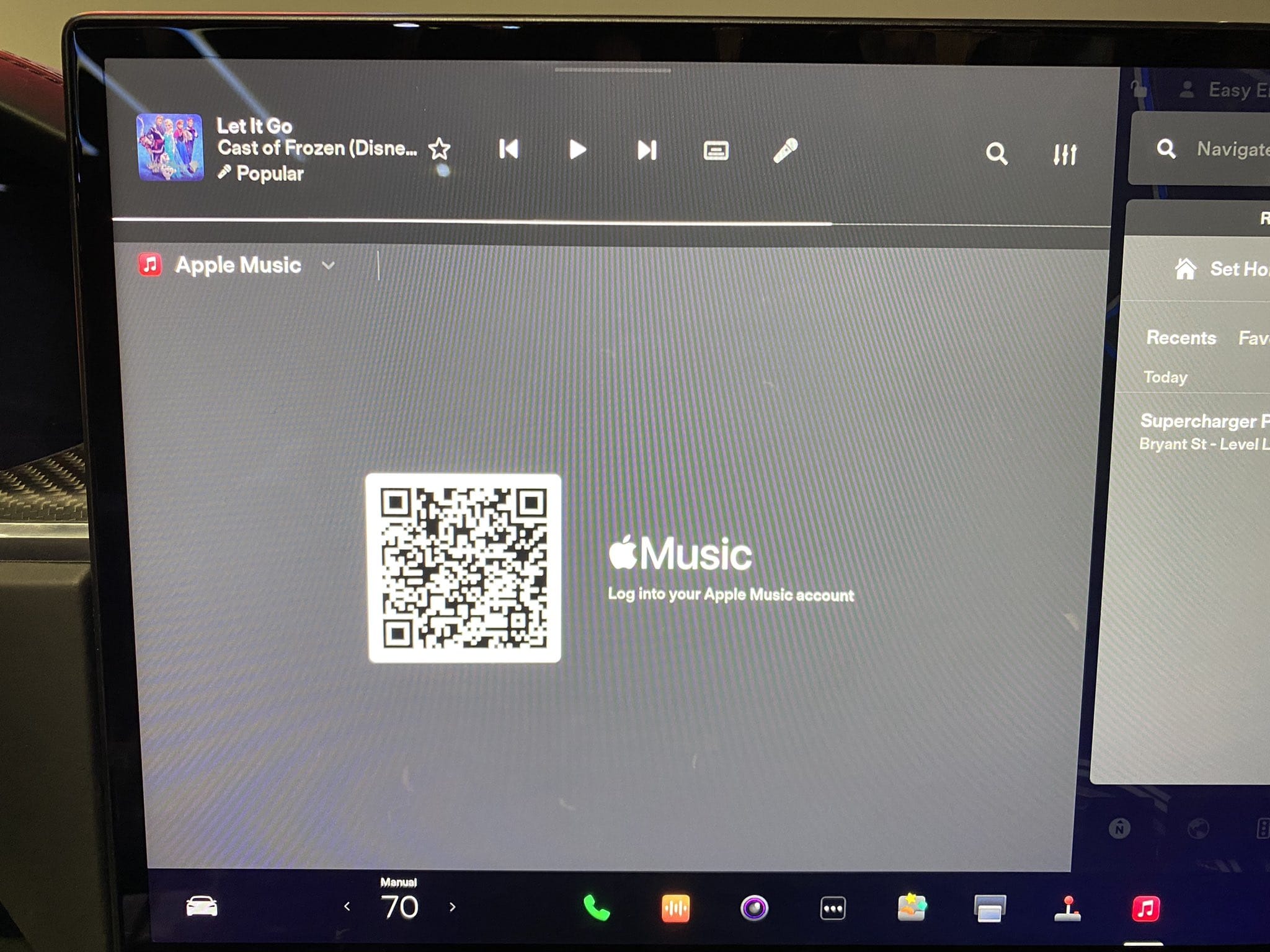 Tesla's interface in the museum exhibit showed Apple Music integration.