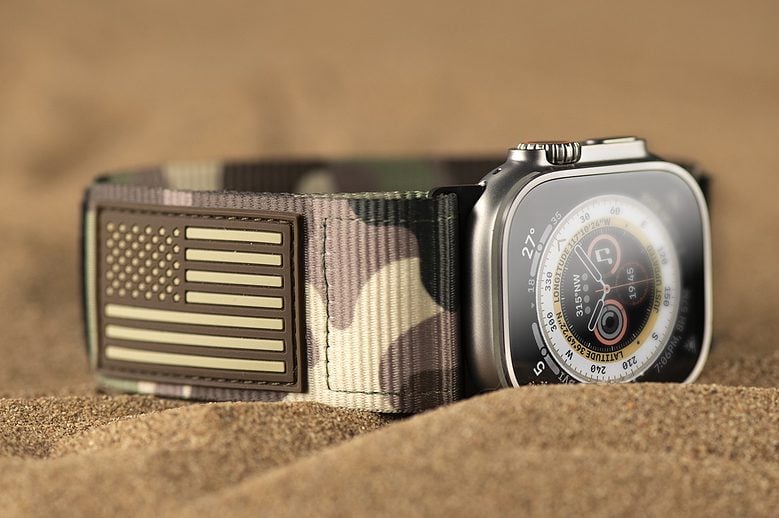 This Apple Watch Ultra sports a camo band with U.S. flag.