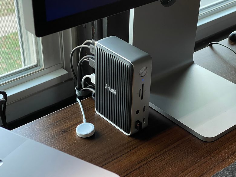 The Anker hub is a key element in the setup, connecting the laptop, the displays and more.