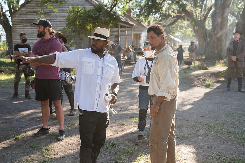 Apple TV+ review: Director Antoine Fuqua, left, and actor Will Smith on the set of <em>Emancipation.</em>