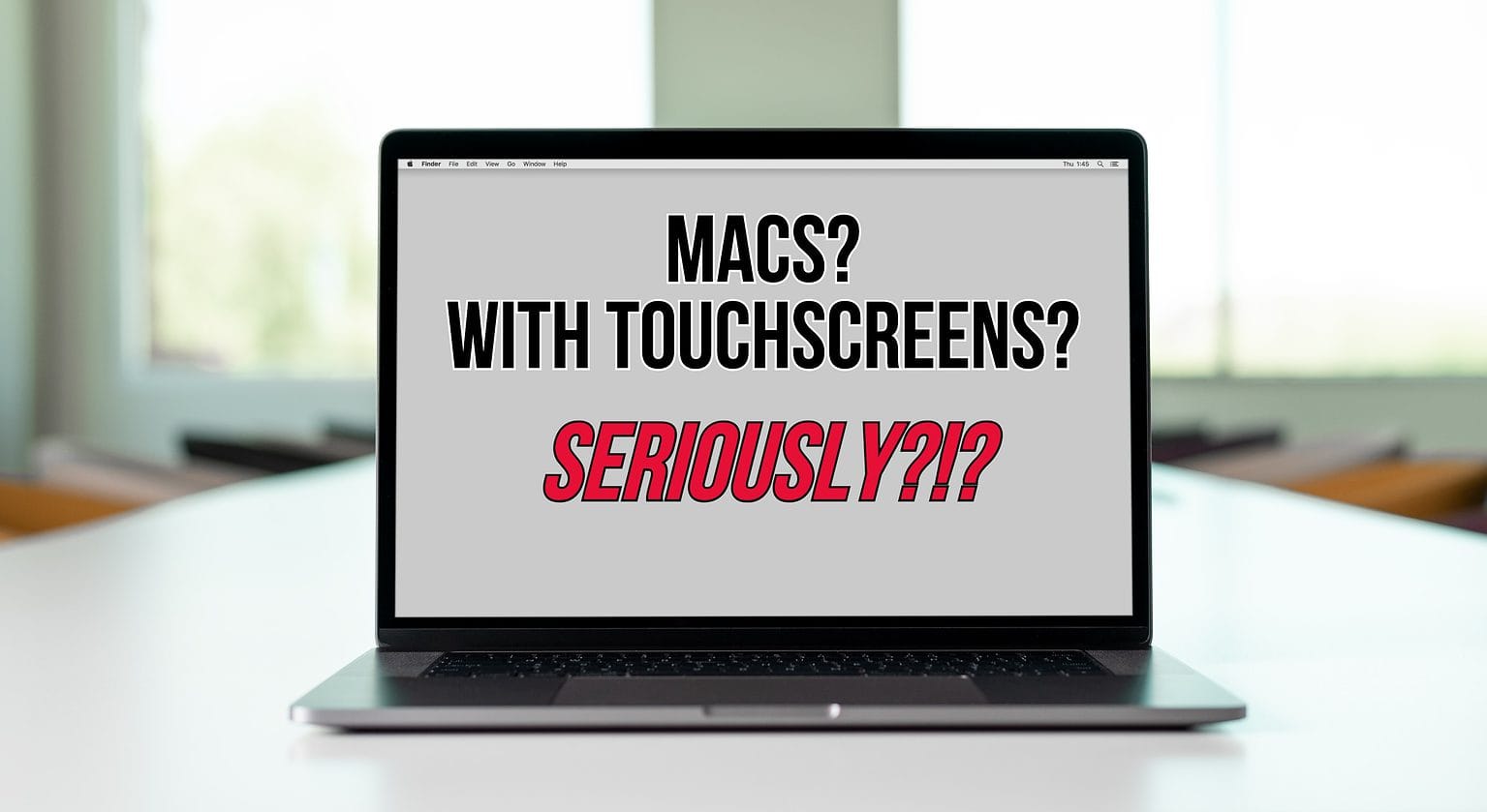 A Macbook with the words: Macs? With touchscreens? Seriously?!?