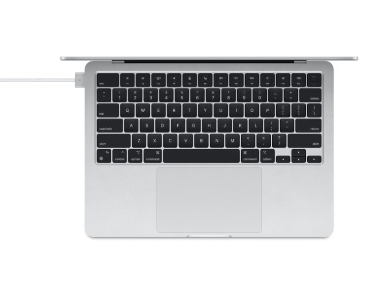MacBook with attached USB-C to MagSafe 3 Cable (2 m)