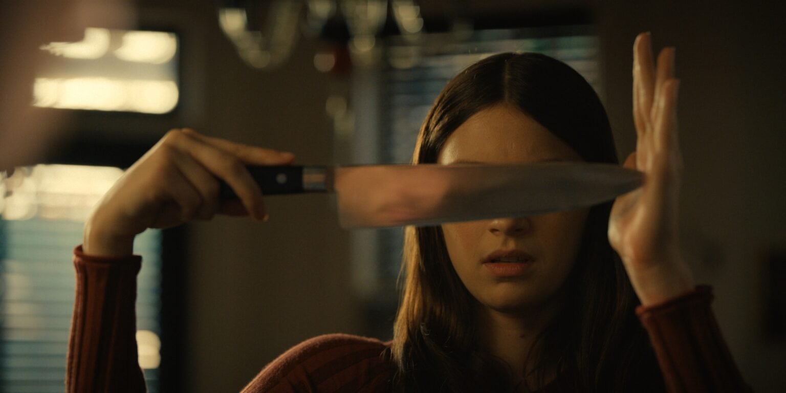 Leanne (played by Nell Tiger Free) shows off a chef's knife in a particularly arty scene from Apple TV+ horror series 