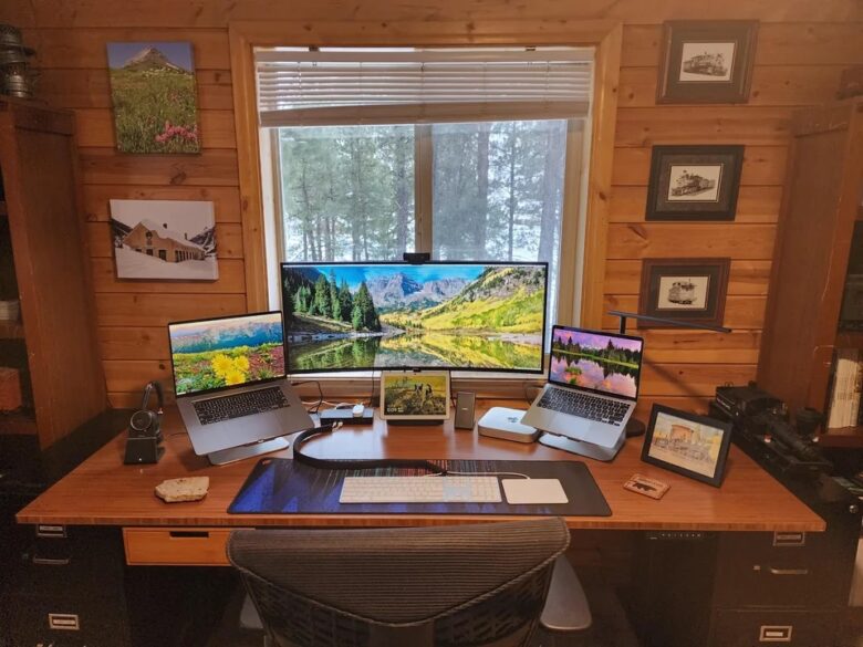 Three Macs and a KVM switch with a big external monitor can be the perfect solution.