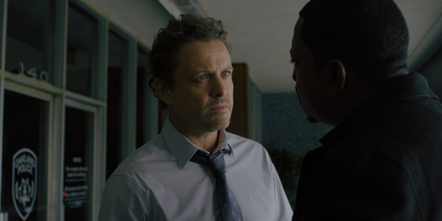 David Lyons and Mekhi Phifer face off in a scene from crime drama 