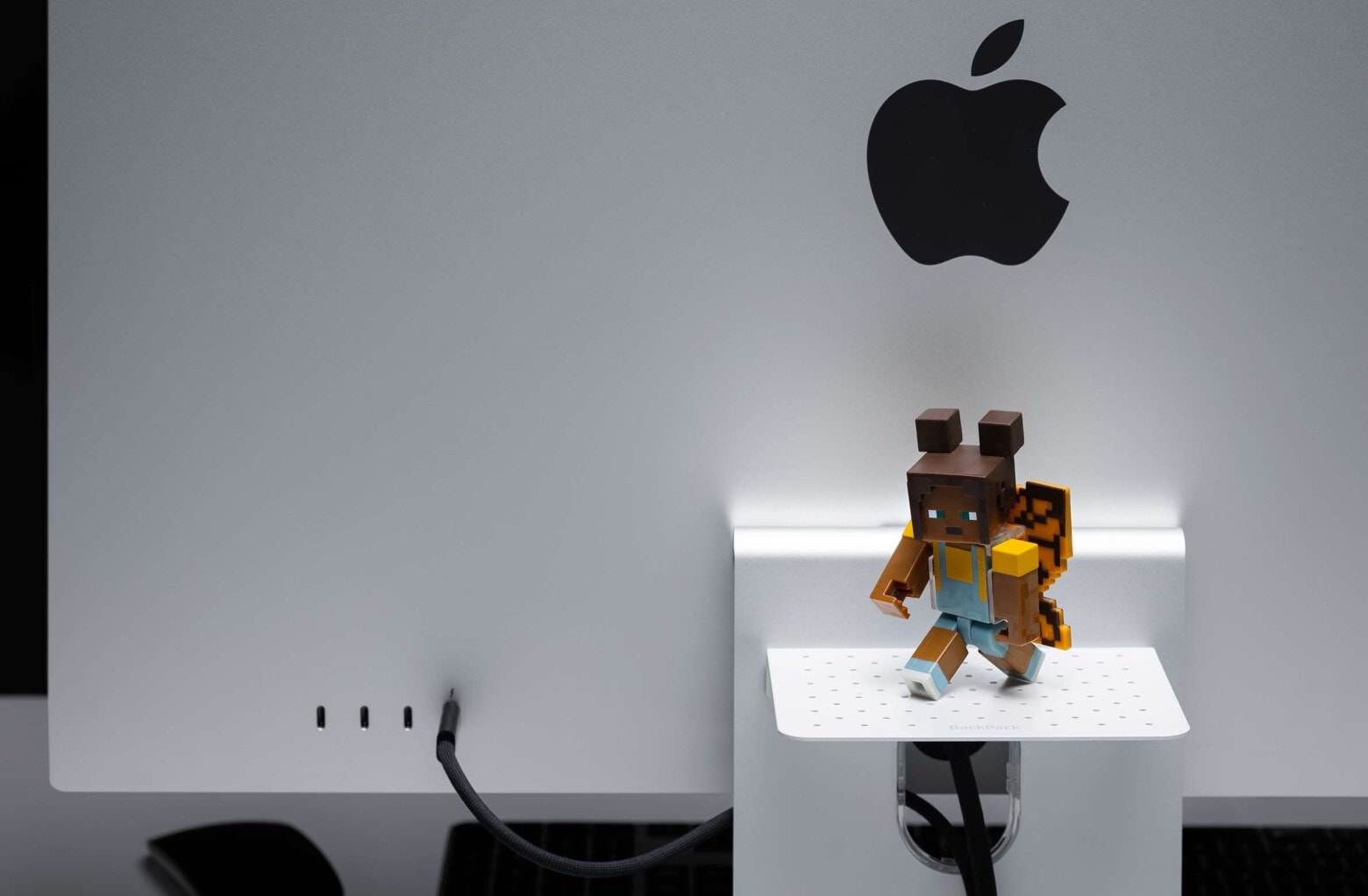 Handy shelf makes the back of iMac or Apple Studio Display useful