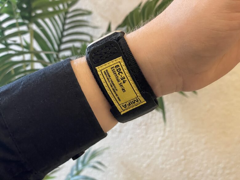 Mifa's Nylon Sports Leather Apple Watch Band with a bright yellow tag.