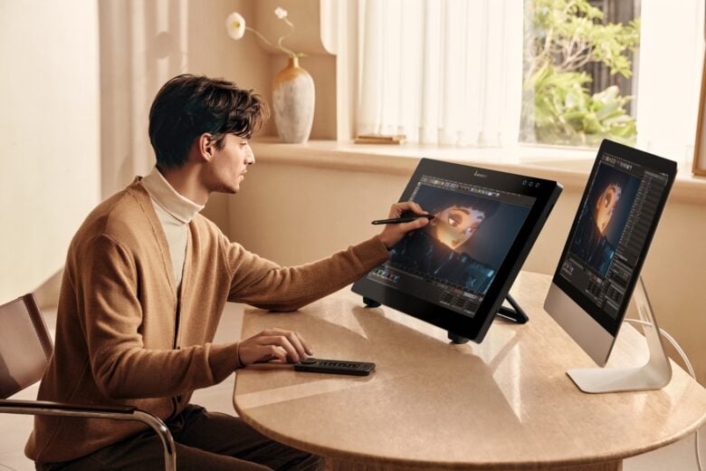 PD24 Lifestyle Photo (17)-2 The QuickKeys device can be attached anywhere on the side of the display or used separately.