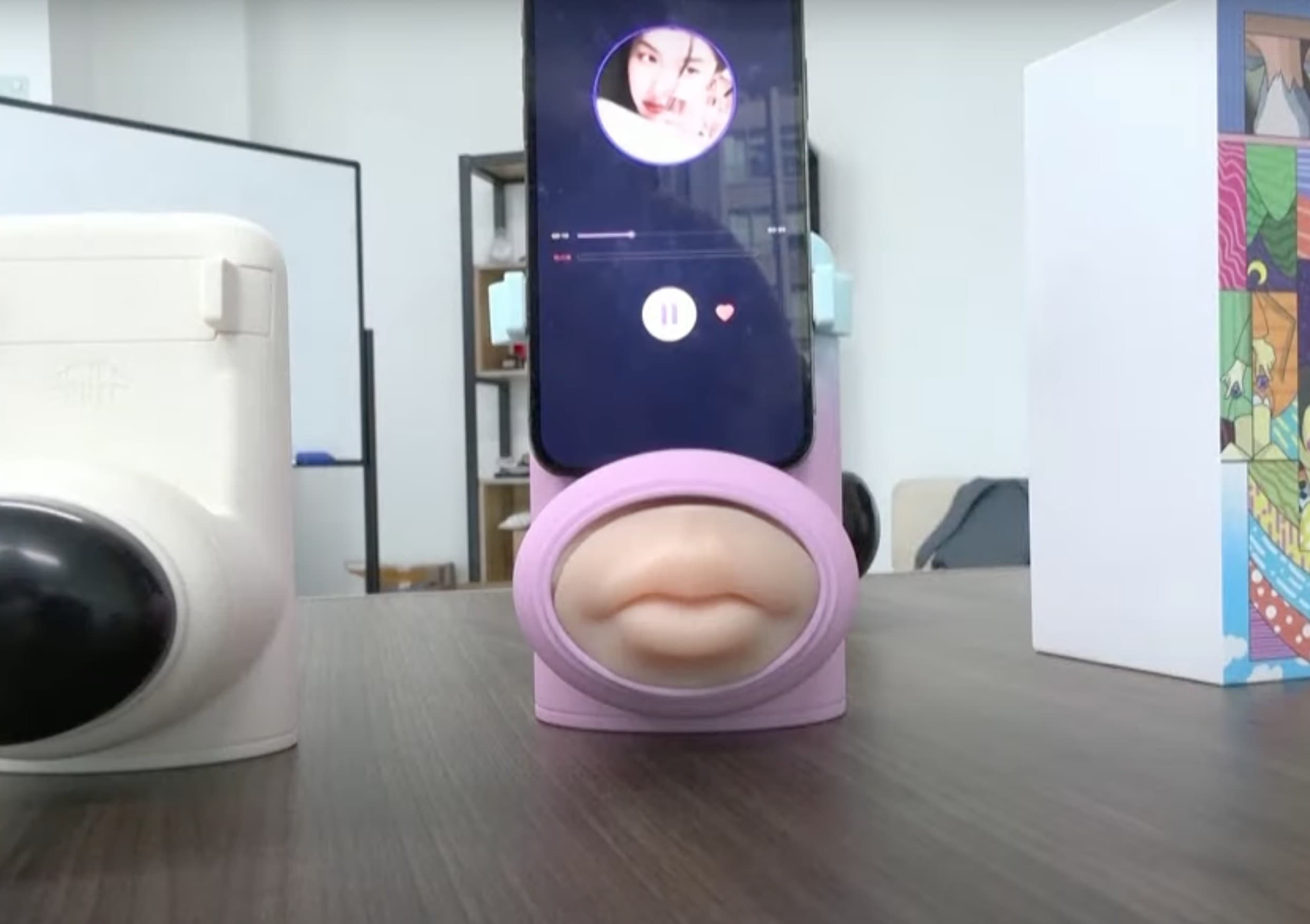Missing someone? Pair iPhone with this creepy new kissing machine.