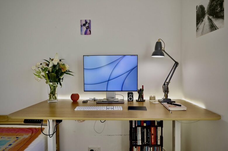 It might take a moment to locate the MacBook Pro in this photo, even with the help of that nice Anglepoise desk lamp.