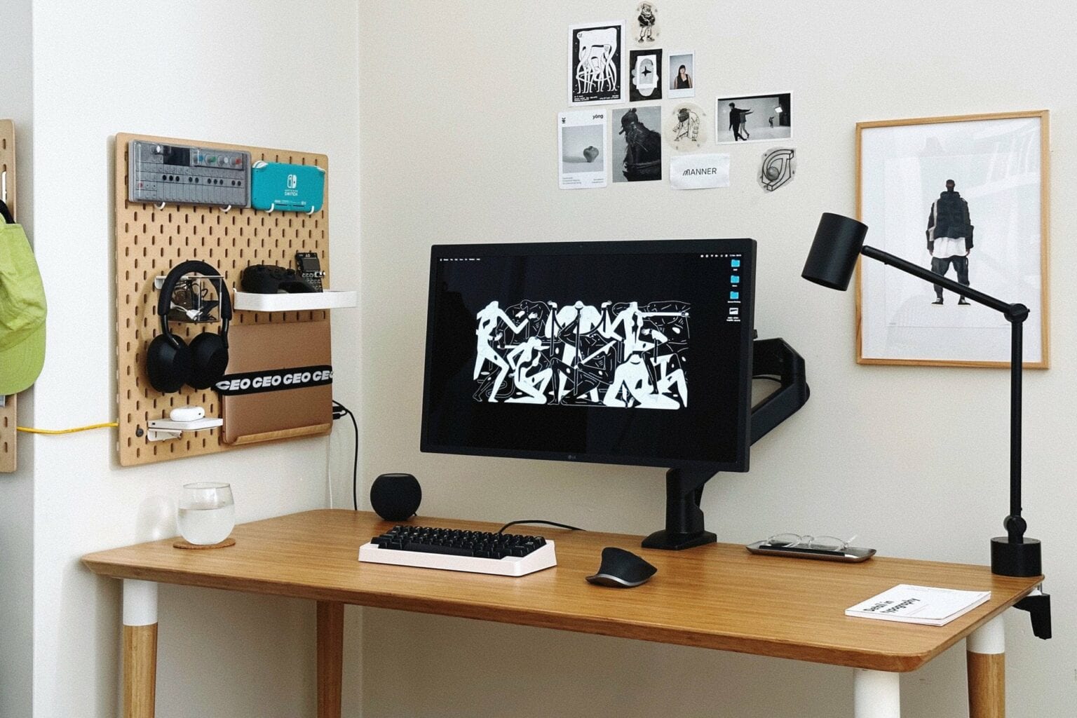 Want to save some space on the desk? Try mounting your laptop on a pegboard.