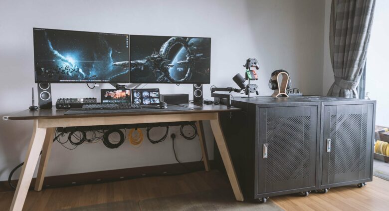 The cabinet on the right holds the computers and more.