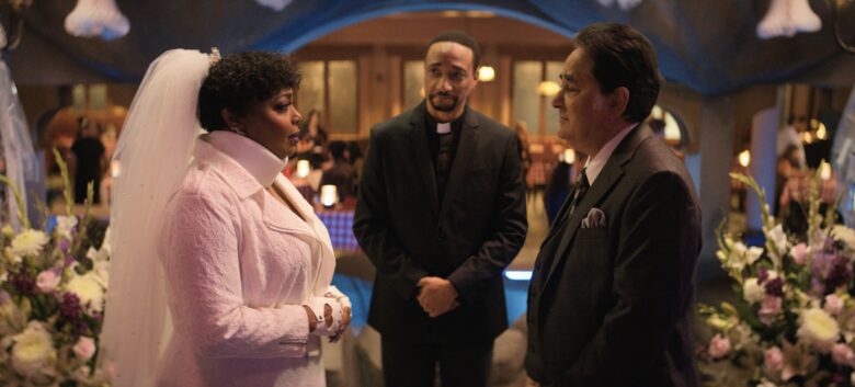 Cocoa Brown, Damon Gupton and Noor Naghmi in "The Big Door Prize," now streaming on Apple TV+.