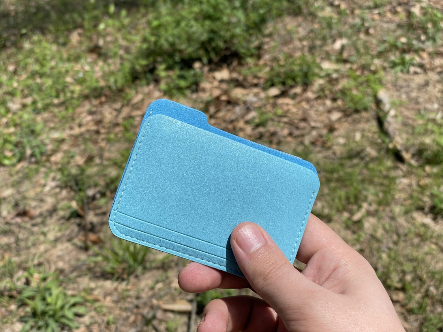 Untitled Folder Wallet in hand outside