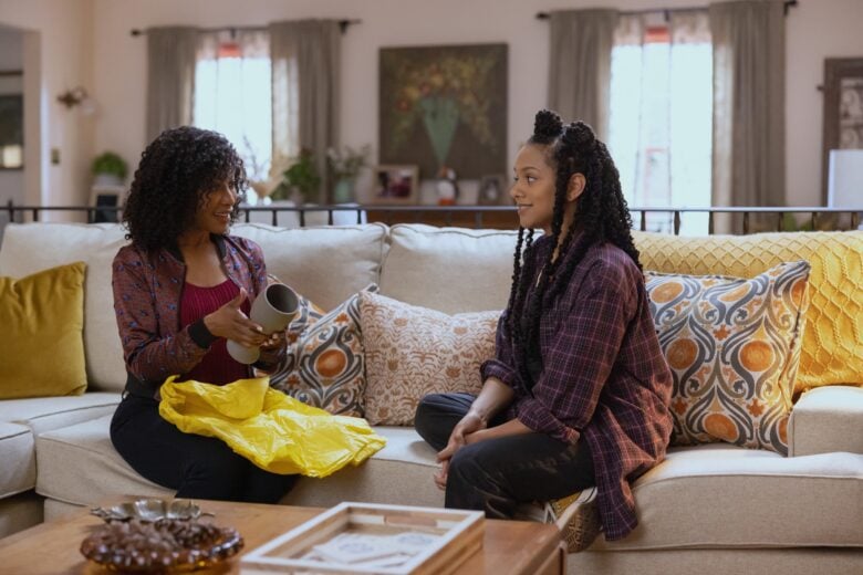 Gabrielle Dennis and Djouliet Amara in "The Big Door Prize," now streaming on Apple TV+.