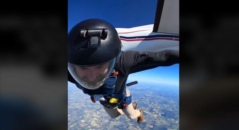 Smith, just through the airplane's door, loses his iPhone at 14,000 feet.