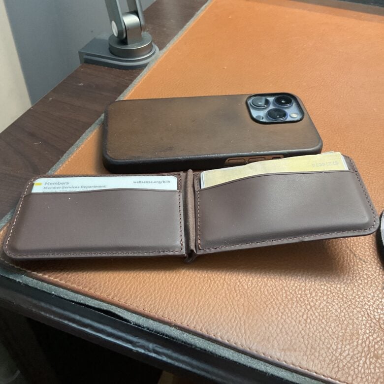 The wallet flips open to reveal two shallow card holders. It also protects RFID cards from