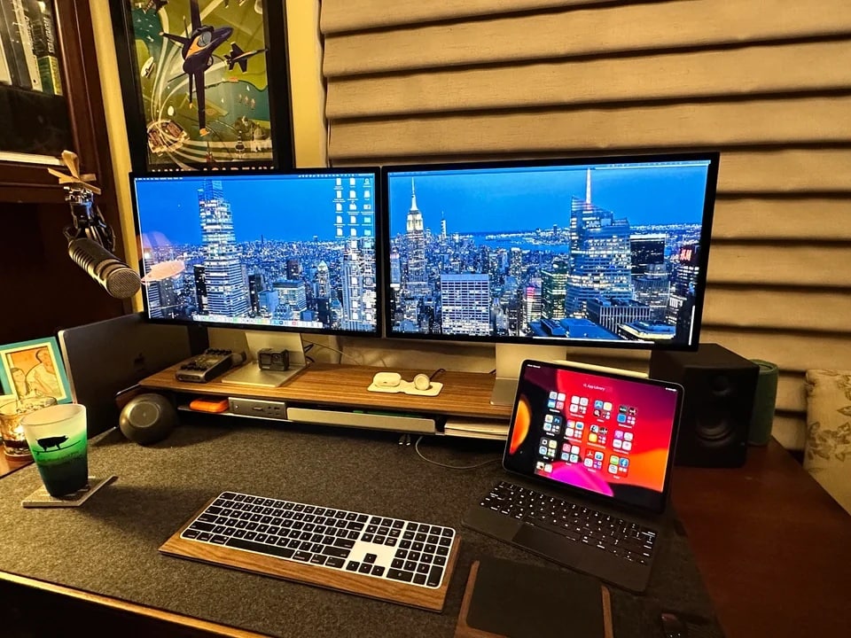 A powerful new MacBook Pro and two Studio Displays make the most of this attractive setup.