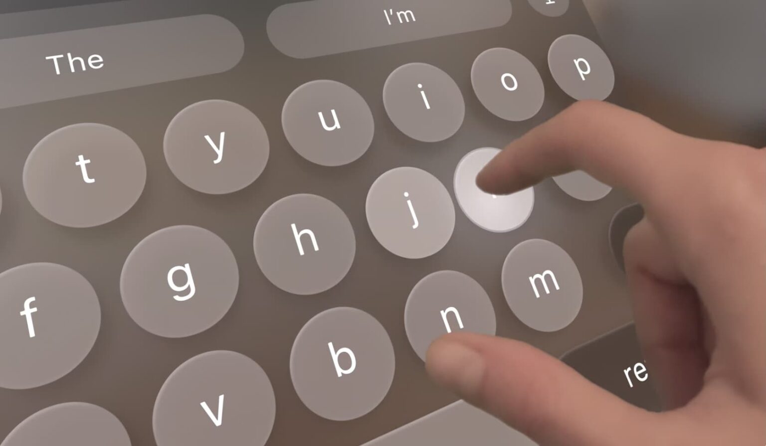 Hand touching a floating keyboard typing on Vision Pro