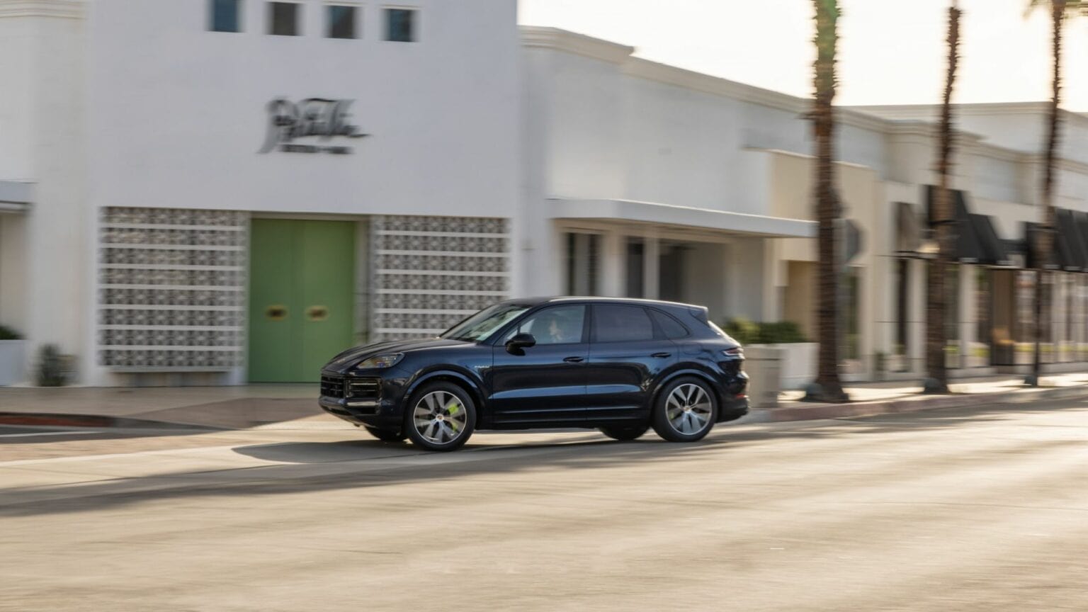 There goes the latest Porsche Cayenne with the new CarPlay app integration.