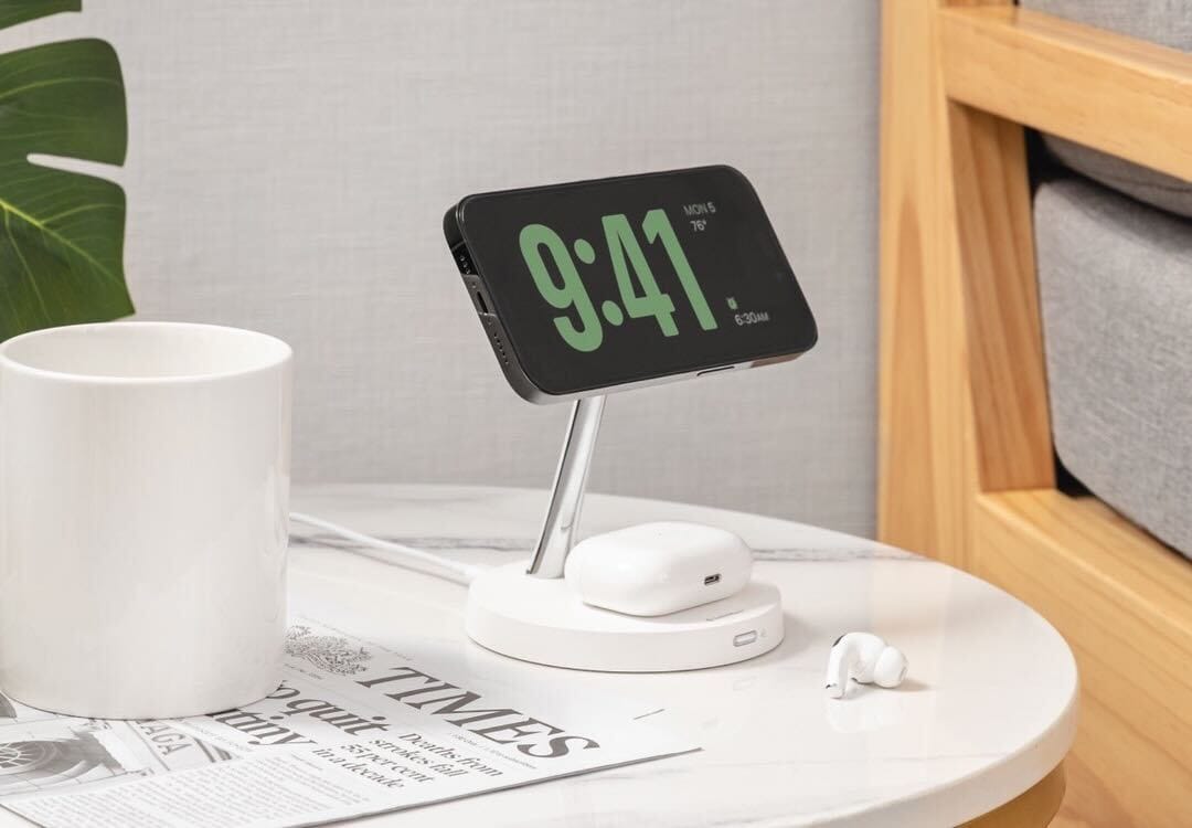 SwitchEasy MagPower charging stand with an iPhone in StandBy mode.