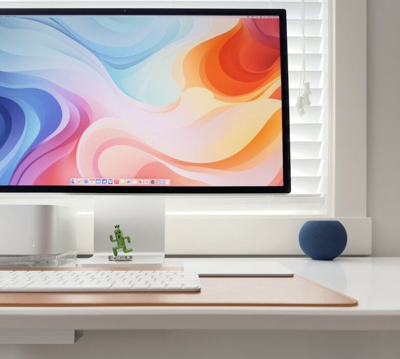 Basic Apple Guy setup 2 With no desk backing and just a 1.5-inch wood frame, he had to be clever about hiding about 30 feet of cabling.