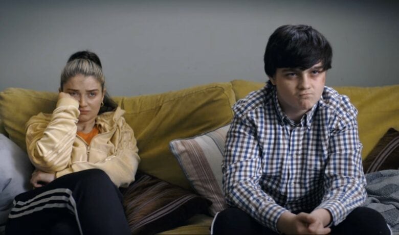 There's the happy mum and her darling boy! Looks like somebody needs a crappy guitar.