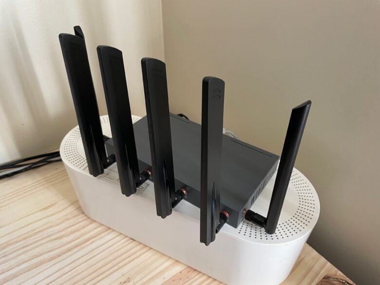 EZ Internet Solutions router sitting on a cable box