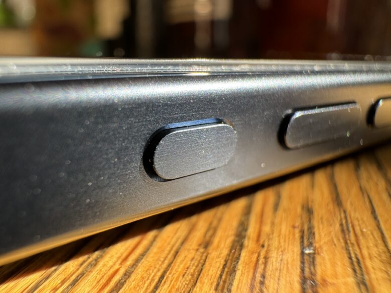 Closeup of iPhone 15’s new Action button.