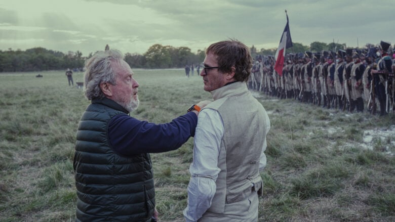 Director Ridley Scott(left) and his leading man in <em>Napoleon,</em> Joaquin Phoenix.