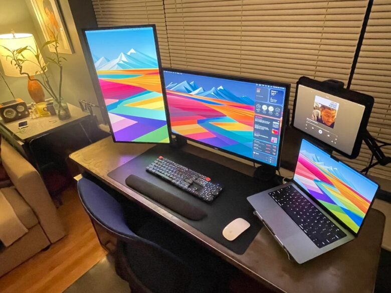 MacBook Pro setup with mounted devices and displays