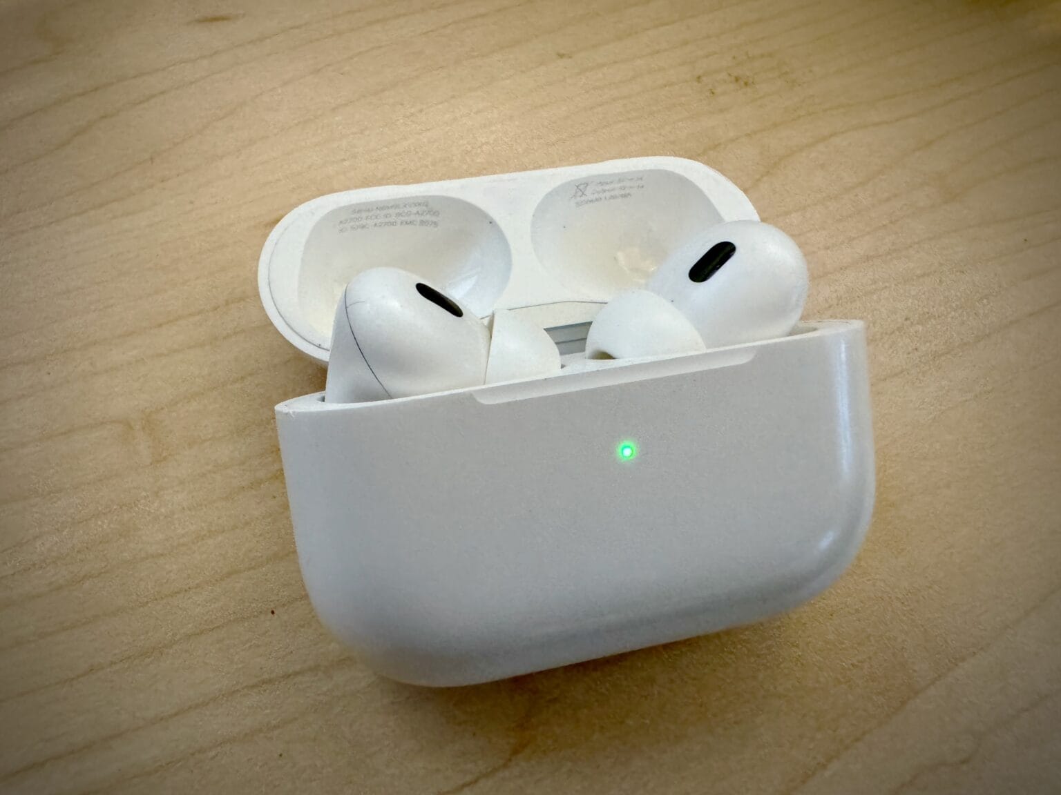 AirPods Pro in an open case.