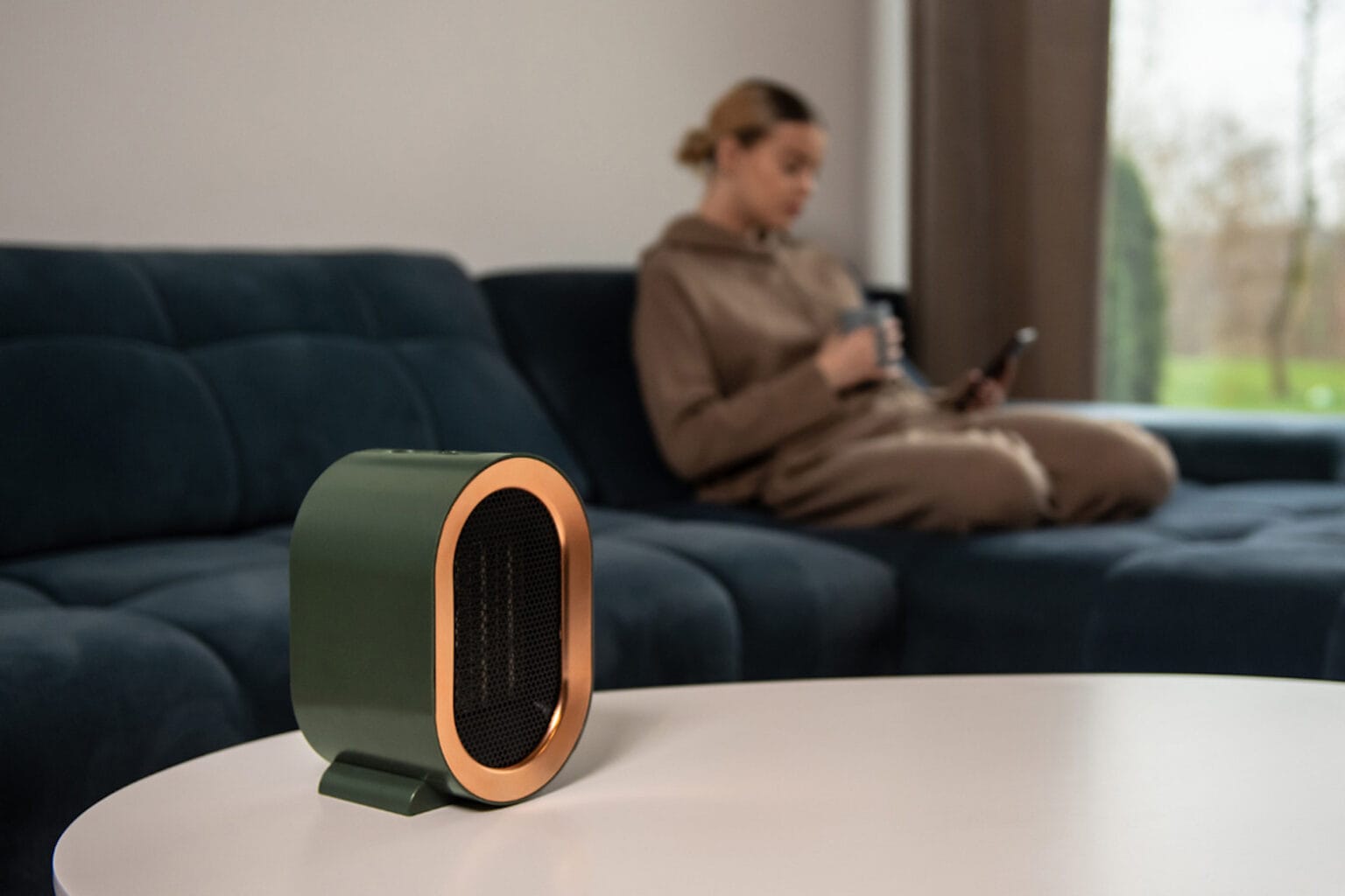 Keep your loved ones warm with the stylish FARA space heater, now under $74.