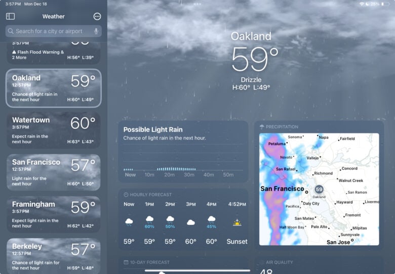 Screenshot of Apple's Weather app with animated rain in the background.