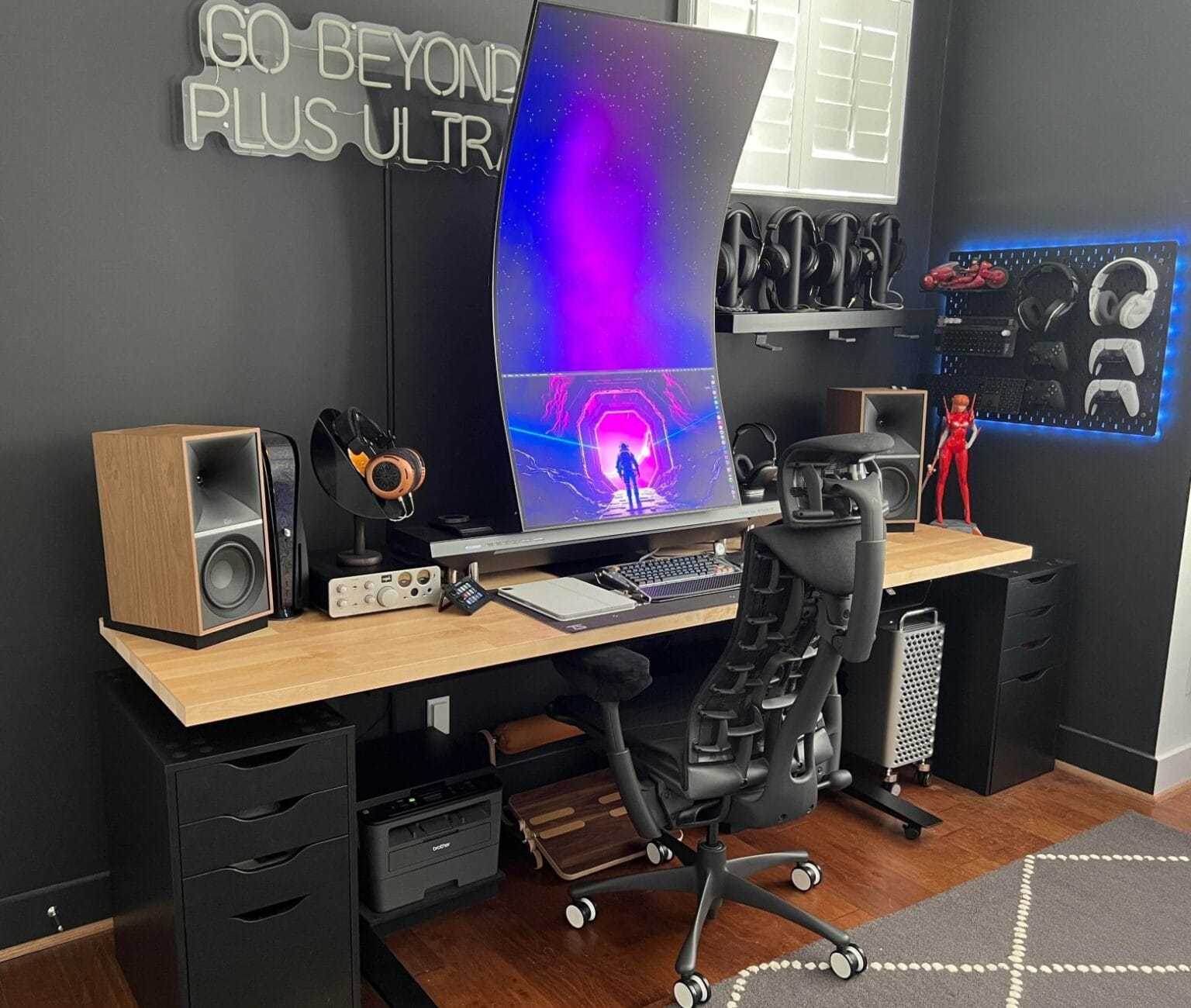 Mac Pro setup with 55-inch curved Samsung display in portrait mode