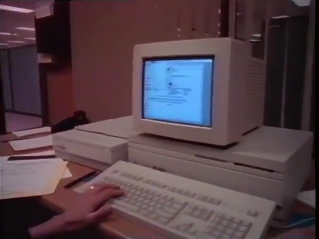Macintosh II with a display sitting on top.