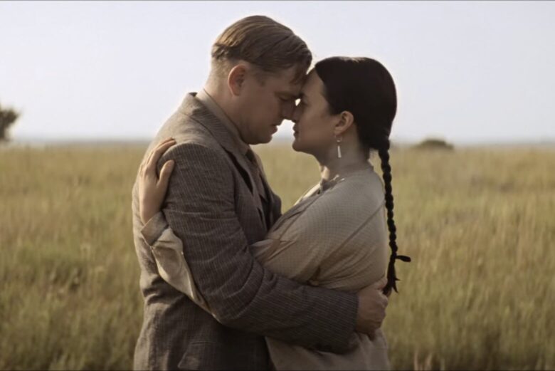 Killers of the Flower Moon promo shot shows Leonardo DiCaprio's and Lily Gladstone.
