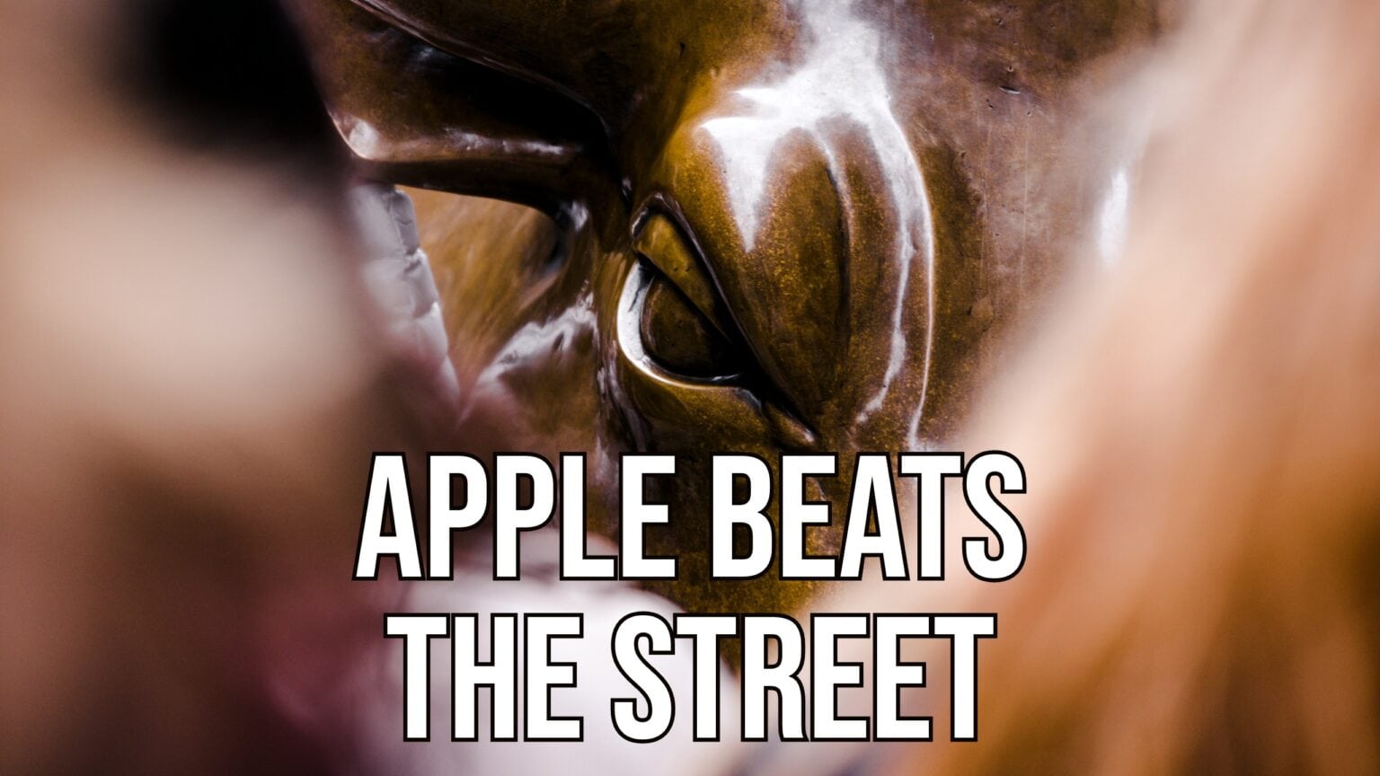 An image of the Wall Street bull with the words 