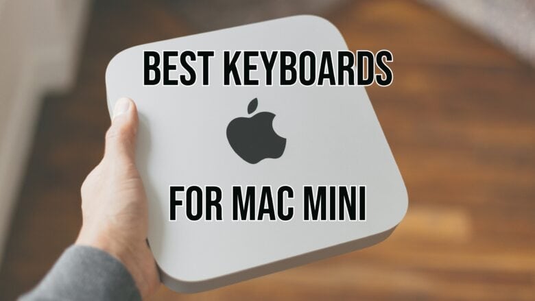 Photo of a hand holding a Mac mini with the words "best keyboards for Mac mini" overlaid.