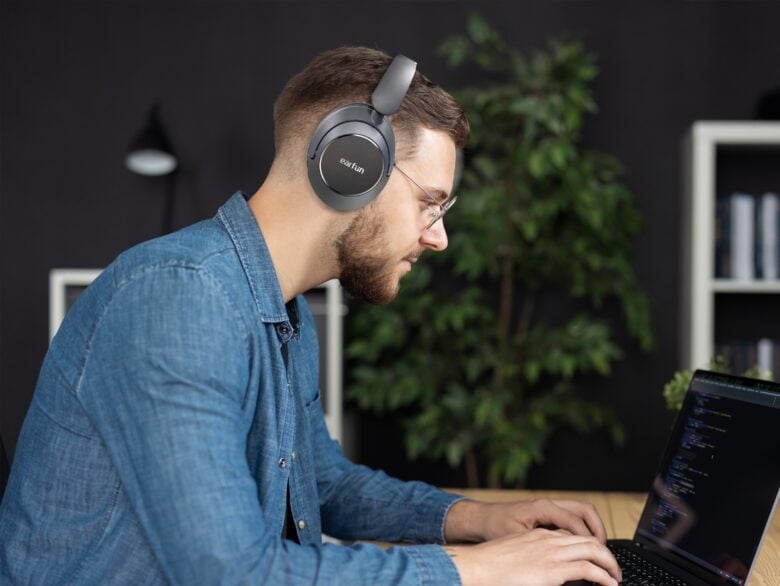 EarFun Wave Pro headphones on laptop user