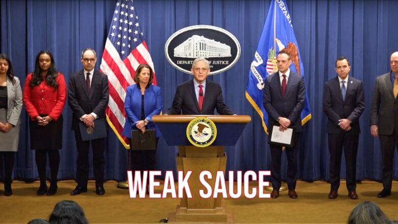 Flanked by colleagues, U.S. Attorney General Merrick B. Garland lays out the Justice Department's antitrust case against Apple.