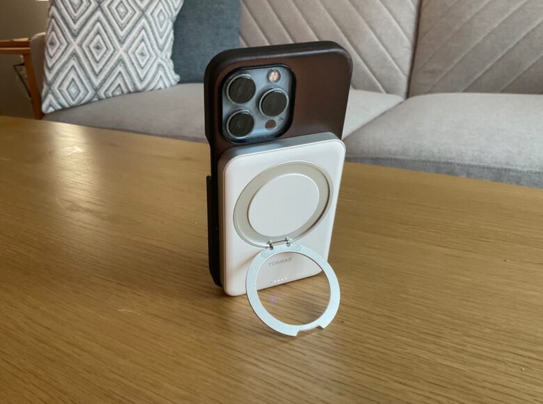 Torras Ostand Power Bank attached to iPhone 13 Pro