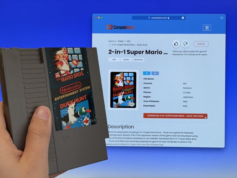 Holding Super Mario Bros. + Duck Hunt cartridge in front of a computer screen, about to download a ROM of the same game
